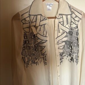 Chic Cream Blouse with Black Geometric Design